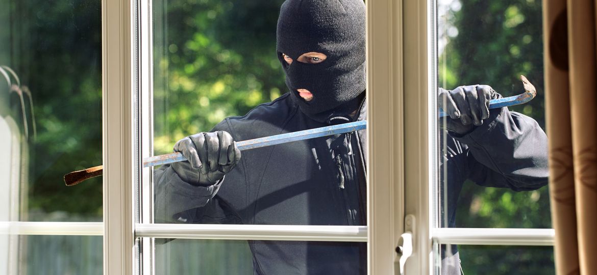 Burglar-breaking-into-a-house